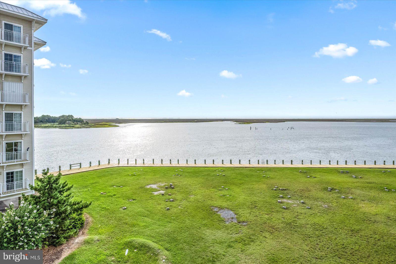 102 Williams Street, Unit 311 Crisfield, MD 21817 - Photo 38 of 57 a view of a lake with a big yard