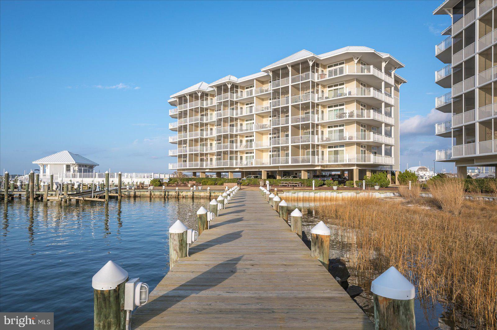 102 Williams Street, Unit 311 Crisfield, MD 21817 - Photo 50 of 57 a view of swimming pool with outdoor seating