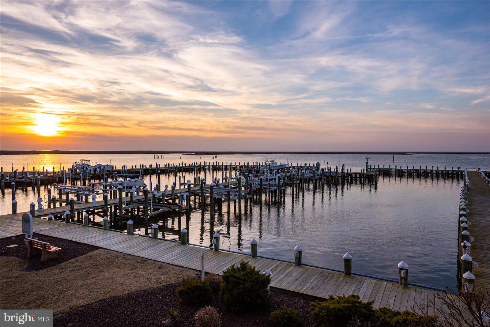 102 Williams Street, Unit 311 Crisfield, MD 21817 - Photo 54 of 57 a view of a lake next to a ocean