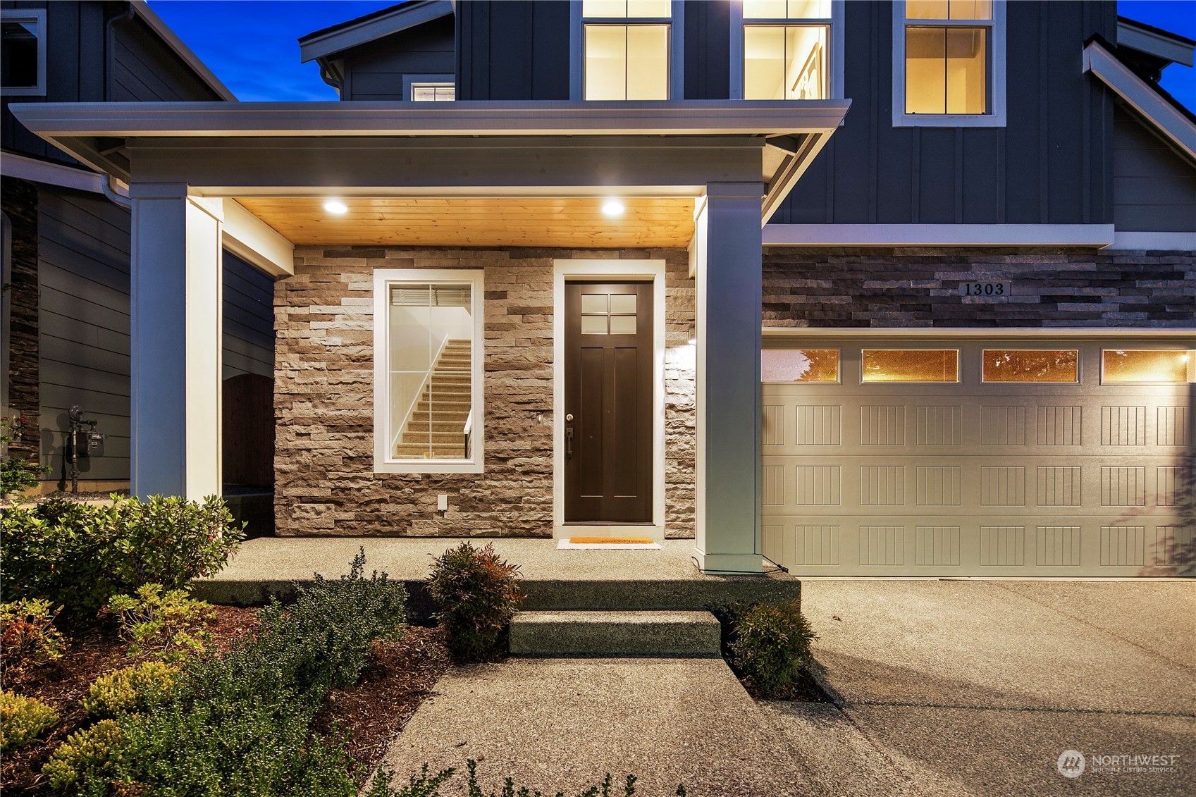 1303 197th Place Southeast Bothell, WA 98012 - Photo 34 of 34 a front view of a house with a yard