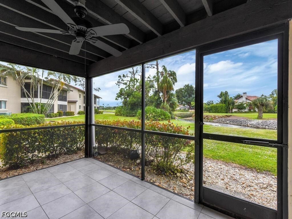 16560 Partridge Place Road, Unit 101 Fort Myers, FL 33908 - Photo 21 of 27 a view of outdoor space with wooden floor