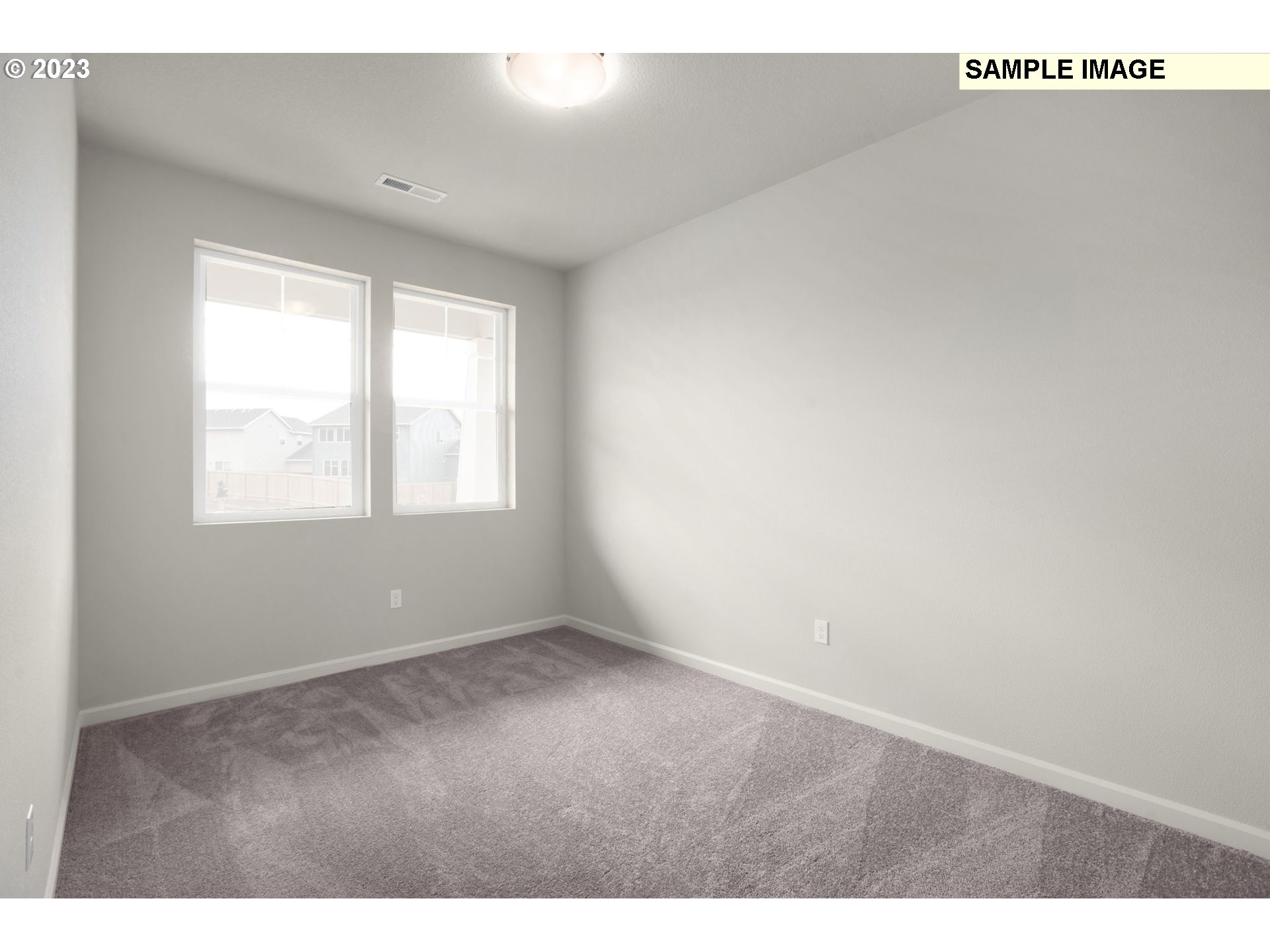 2018 Southeast Teal Avenue Gresham, OR 97080 - Photo 9 of 17 a view of an empty room with a window