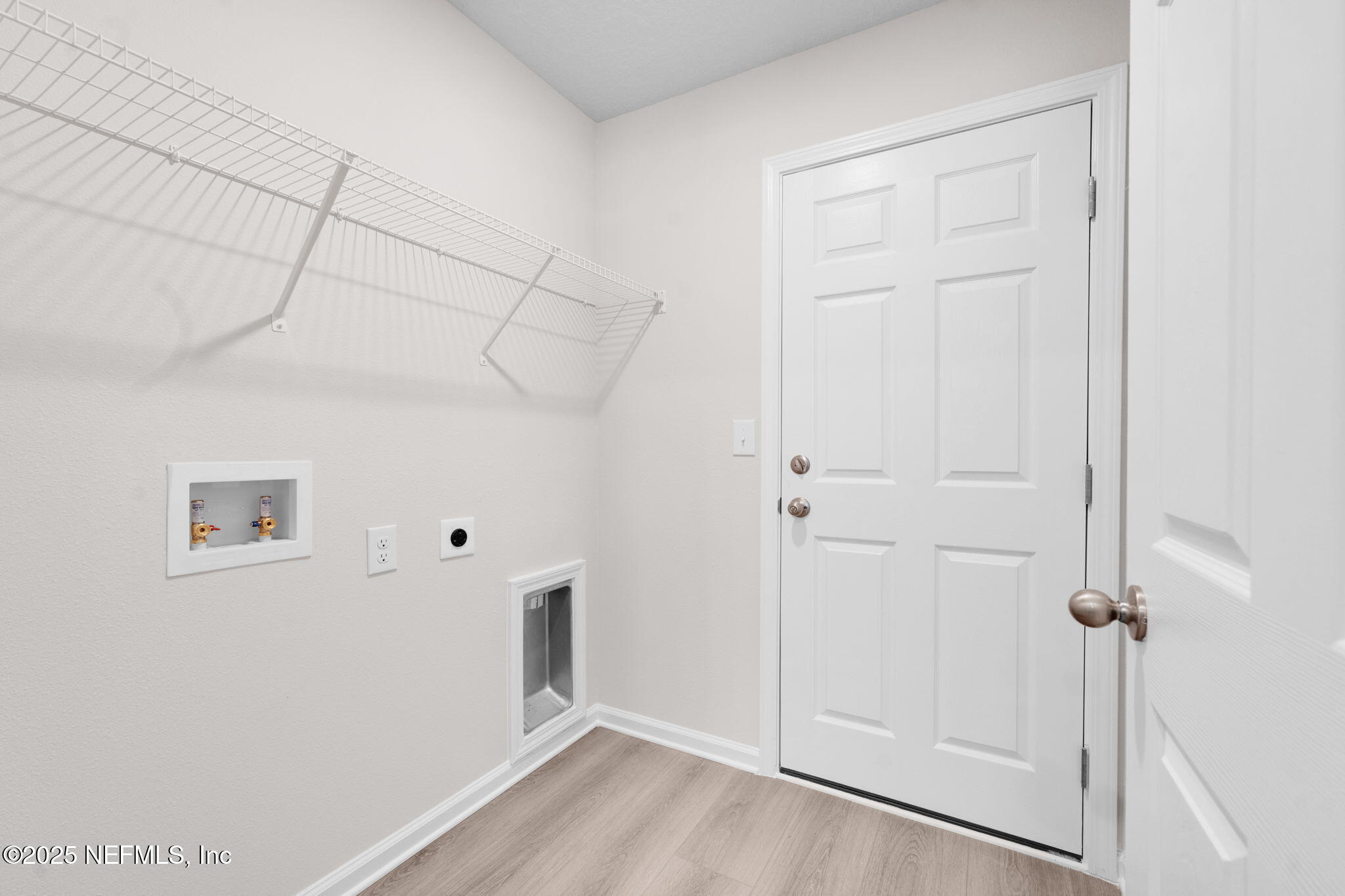 3945 Rose Street Jacksonville, FL 32208 - Photo 12 of 27 a view of a livingroom with wooden floor