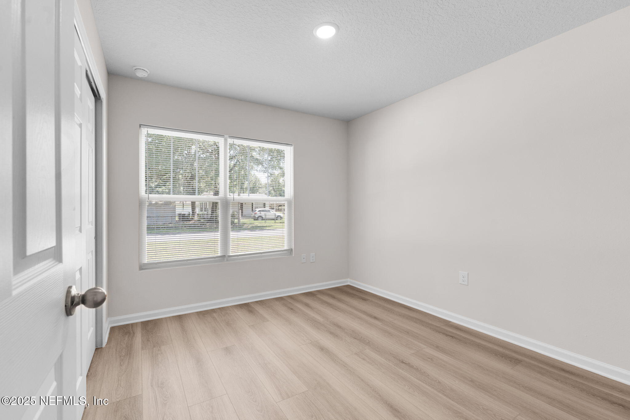 3945 Rose Street Jacksonville, FL 32208 - Photo 23 of 27 an empty room with a window