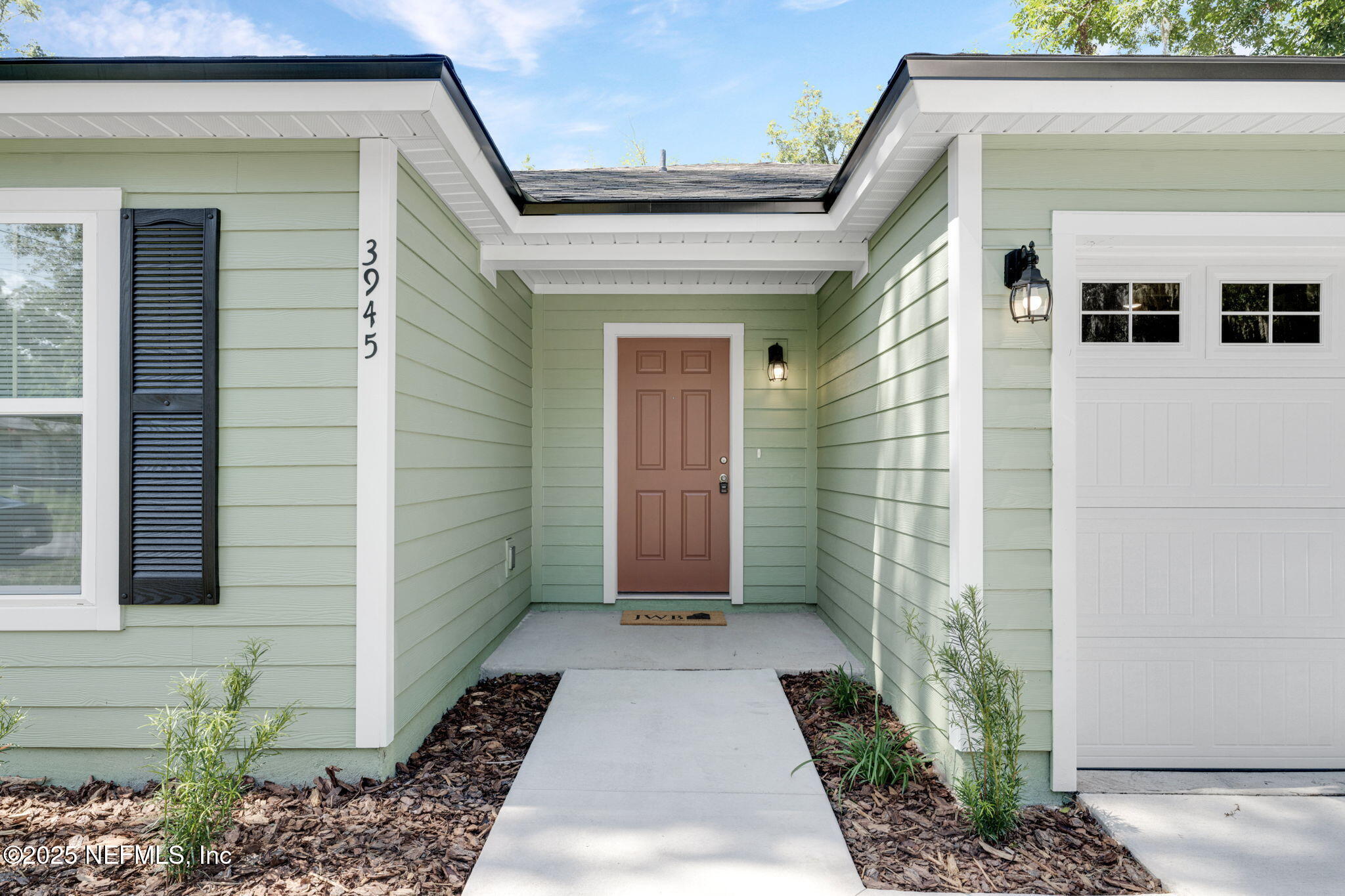 3945 Rose Street Jacksonville, FL 32208 - Photo 3 of 27 a view of a back yard of the house