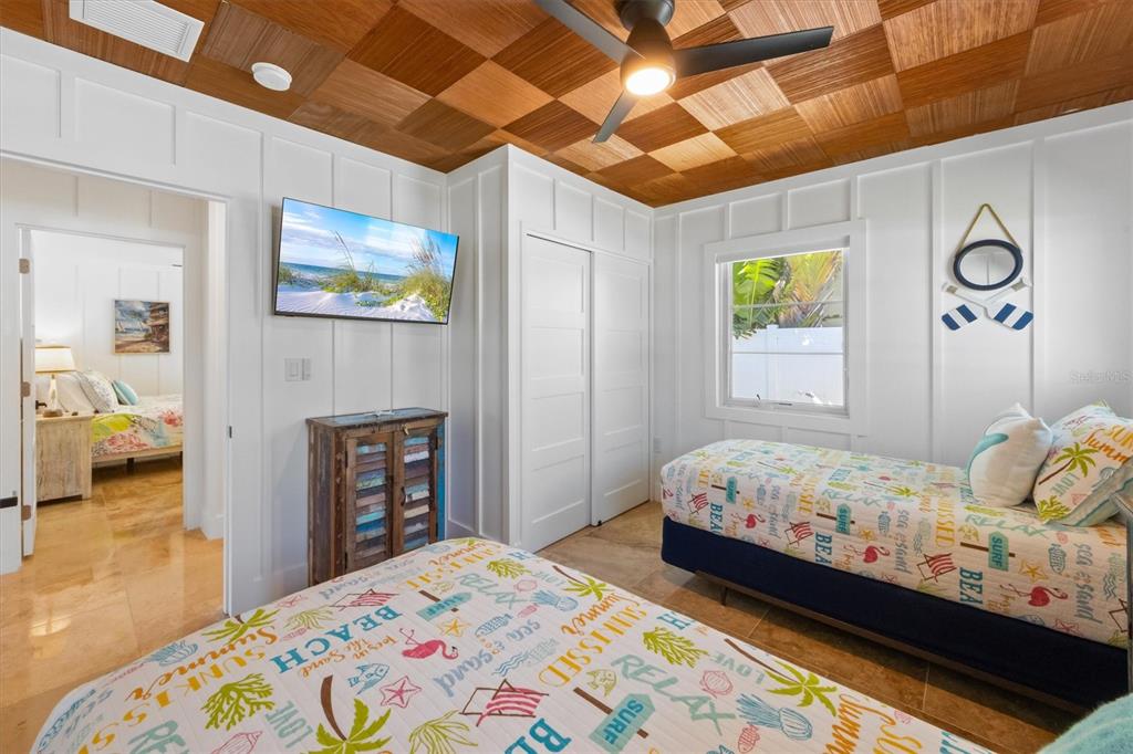 412 Alamanda Road Anna Maria, FL 34216 - Photo 20 of 43 a bedroom with a bed and a dresser