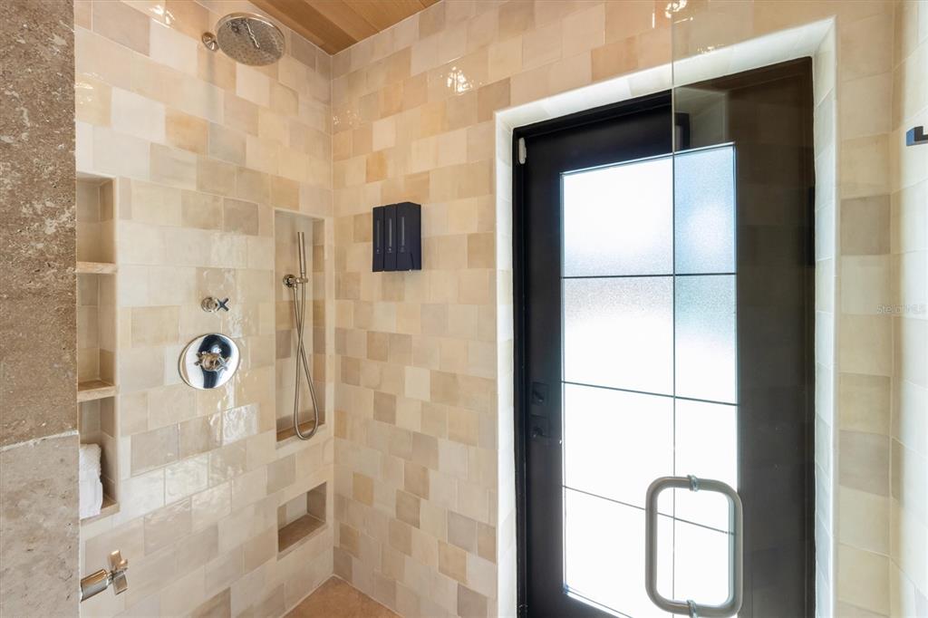 412 Alamanda Road Anna Maria, FL 34216 - Photo 25 of 43 a bathroom with a shower