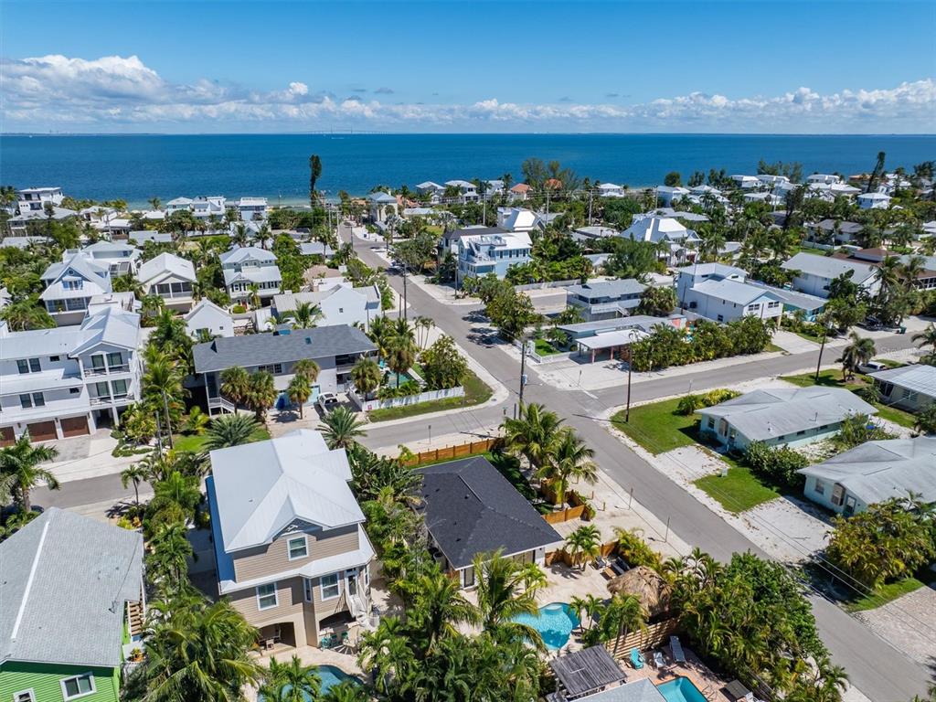 412 Alamanda Road Anna Maria, FL 34216 - Photo 42 of 43 an aerial view of a house with a lake view