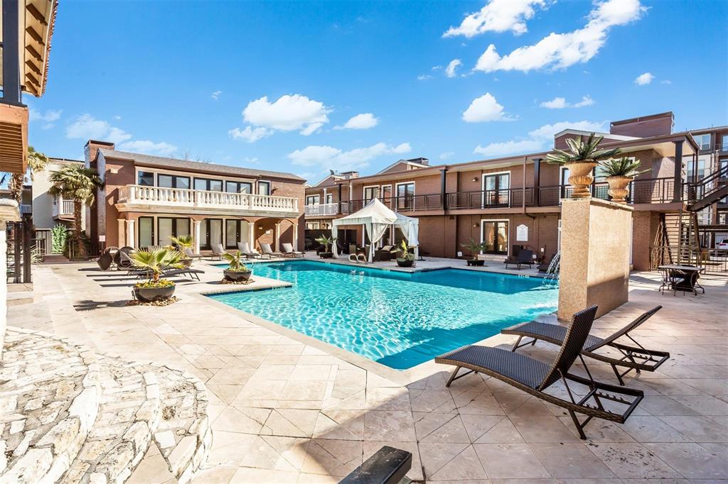 5934 Sandhurst Lane, Unit 207 Dallas, TX 75206 - Photo 28 of 31 a view of a house with backyard porch and sitting area