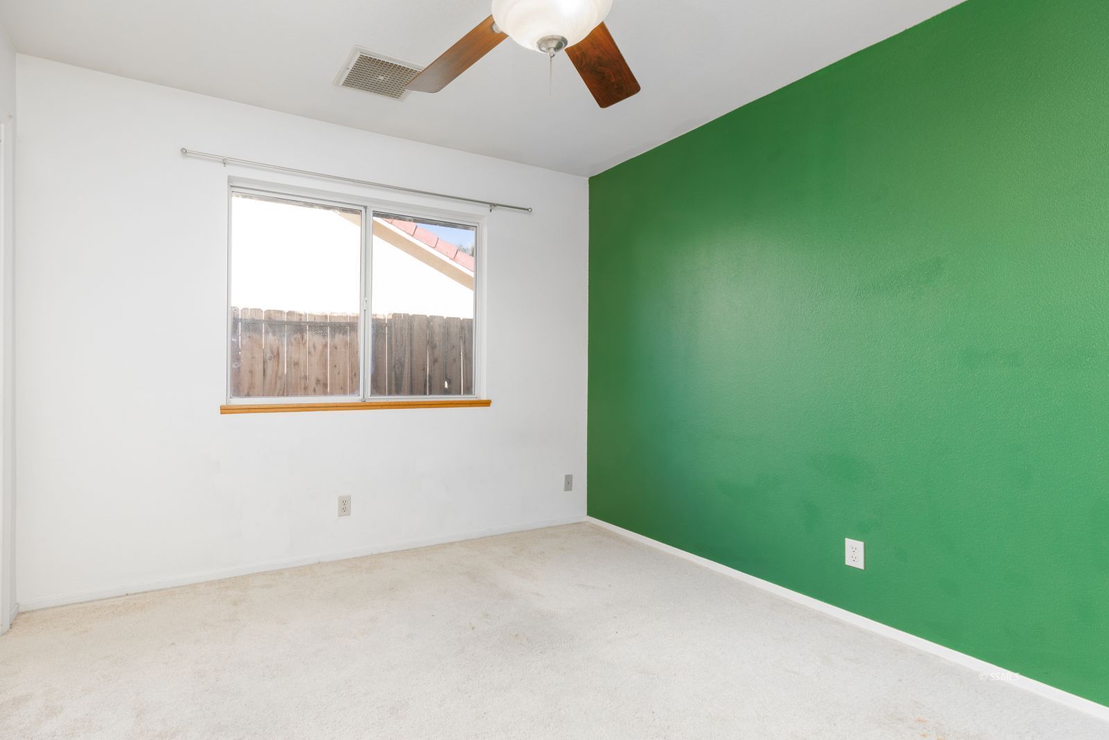 528 Amanda Street Ridgecrest, CA 93555 - Photo 21 of 30 a view of an empty room with a window