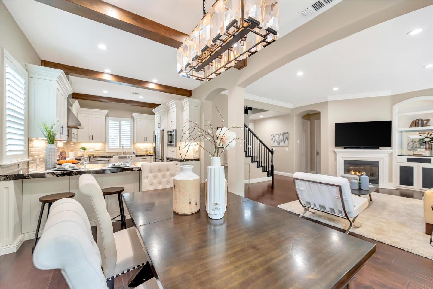2160 Gullane Way Gilroy, CA 95020 - Photo 14 of 40 a living room with lots of furniture and a flat screen tv