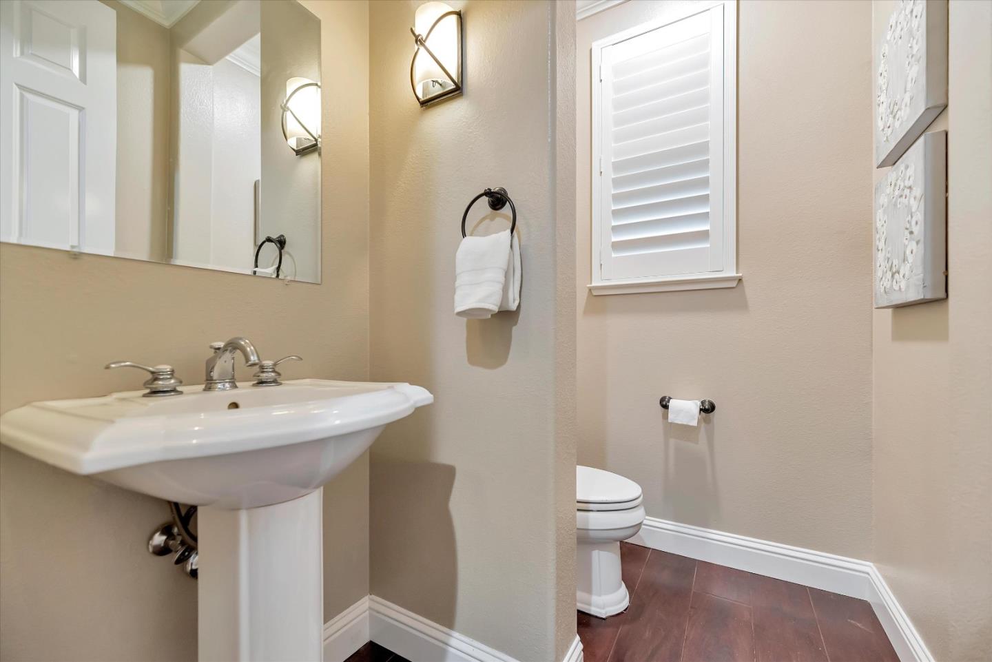 2160 Gullane Way Gilroy, CA 95020 - Photo 17 of 40 a bathroom with a sink a toilet and a mirror