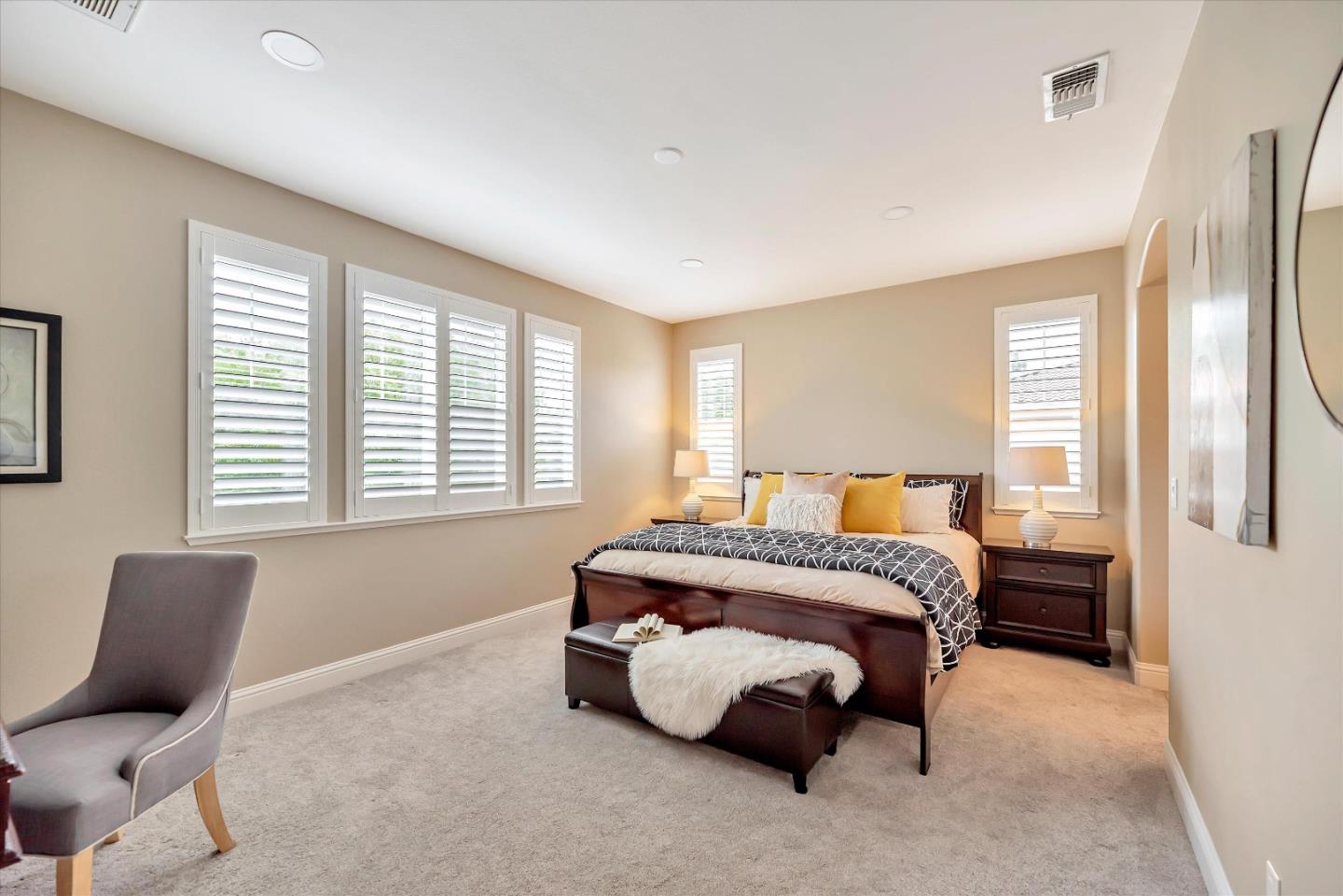 2160 Gullane Way Gilroy, CA 95020 - Photo 24 of 40 a bedroom with bed couch and window