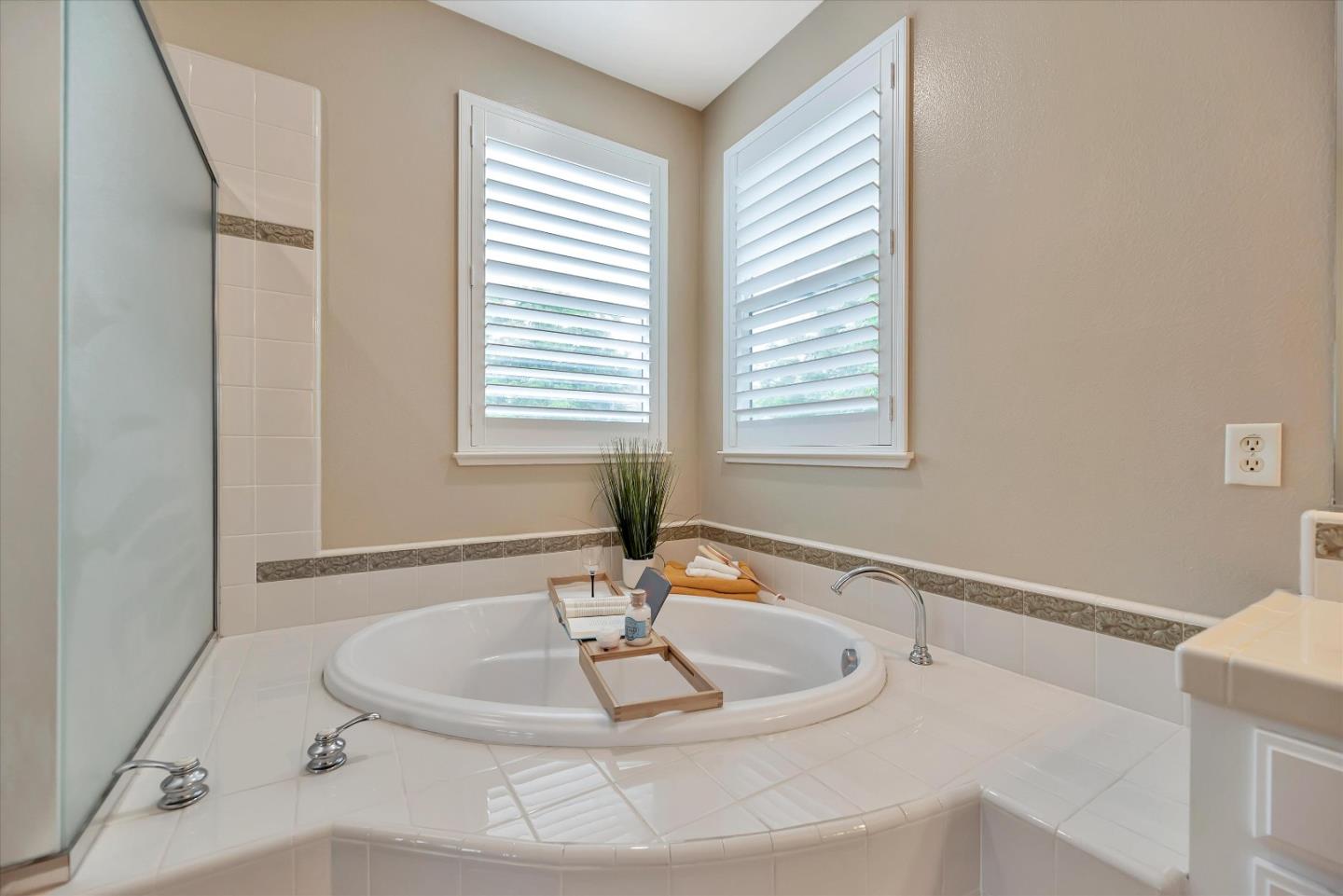 2160 Gullane Way Gilroy, CA 95020 - Photo 27 of 40 a bathroom with a sink and a bathtub