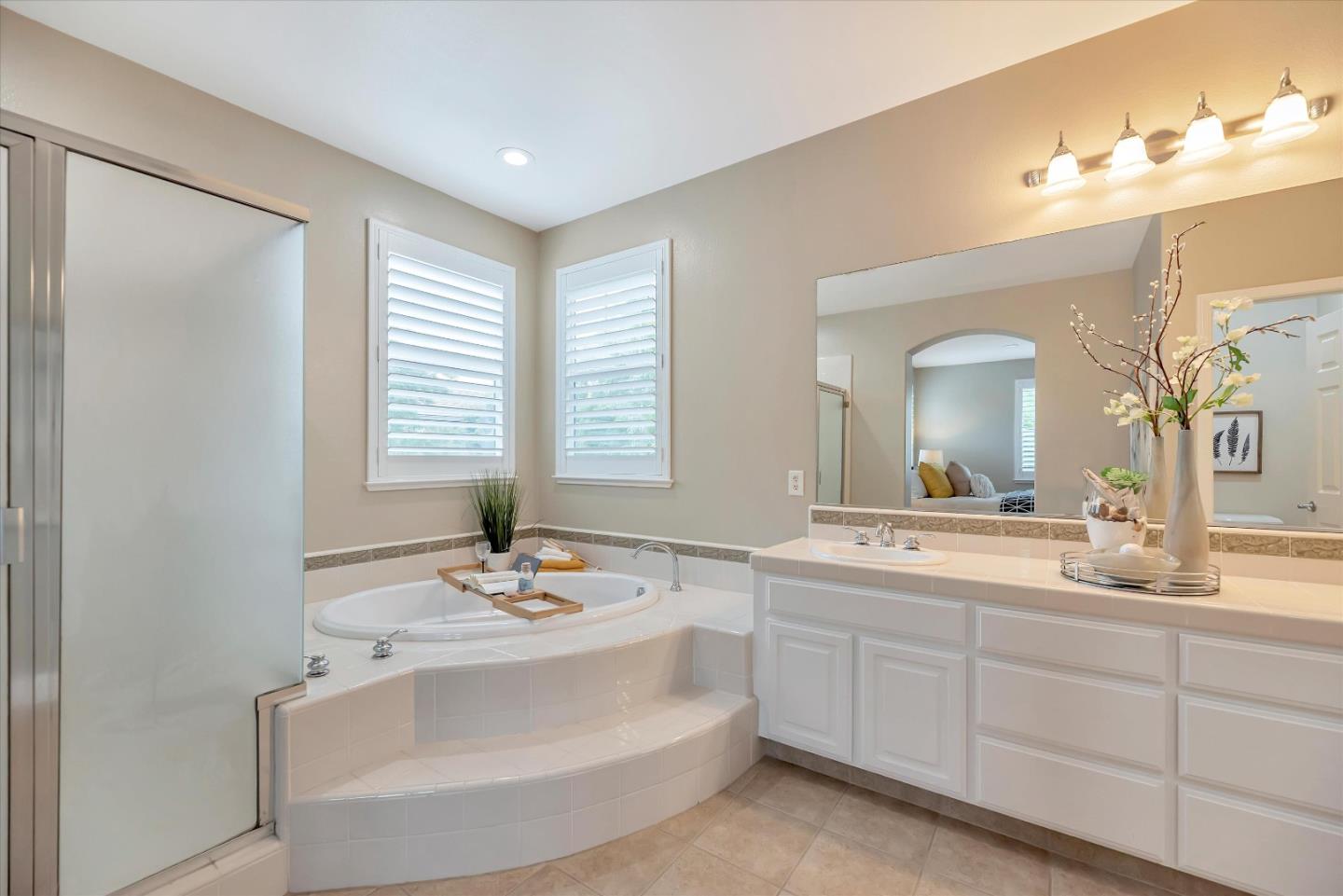 2160 Gullane Way Gilroy, CA 95020 - Photo 29 of 40 a bathroom with a sink and a mirror