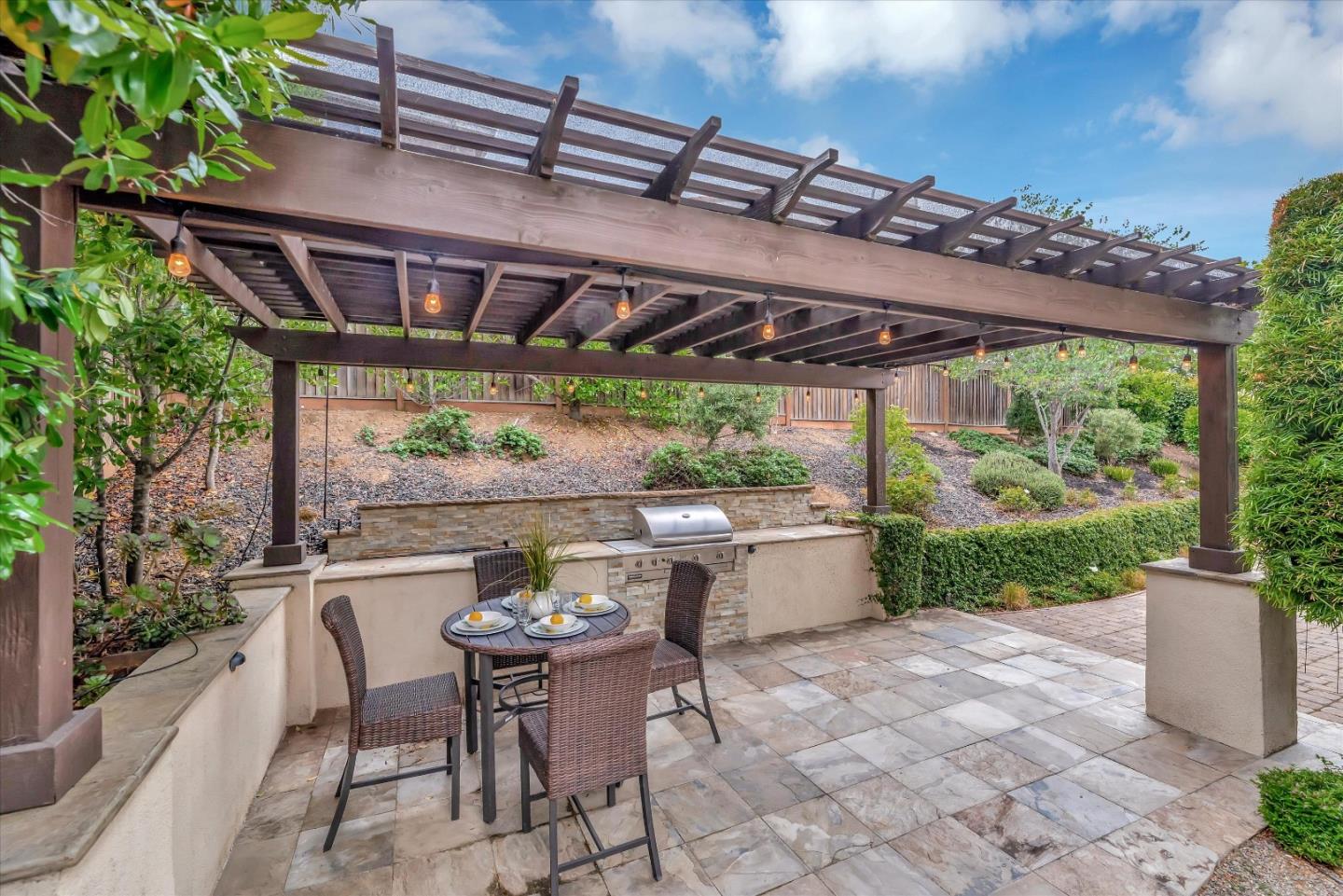 2160 Gullane Way Gilroy, CA 95020 - Photo 37 of 40 a patio with table and chairs