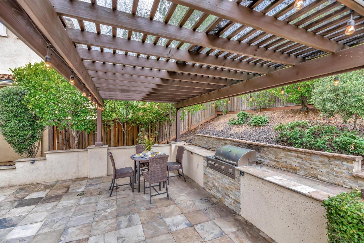 2160 Gullane Way Gilroy, CA 95020 - Photo 38 of 40 a patio view with a table and chairs