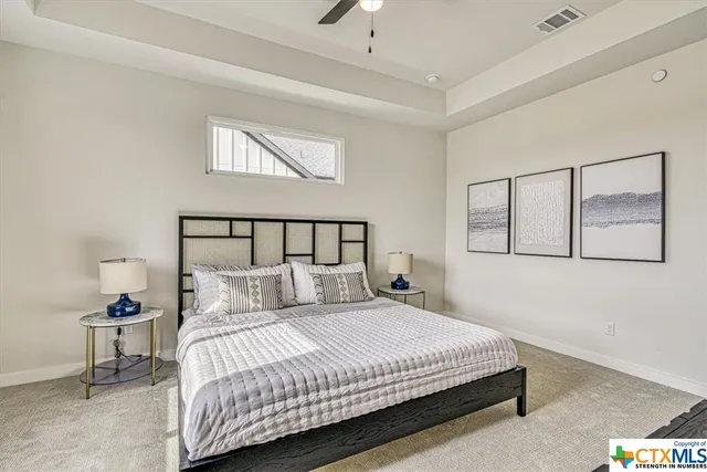 a workspace room with furniture and windows