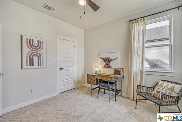 a bathroom with a bathtub shower sink vanity and toilet