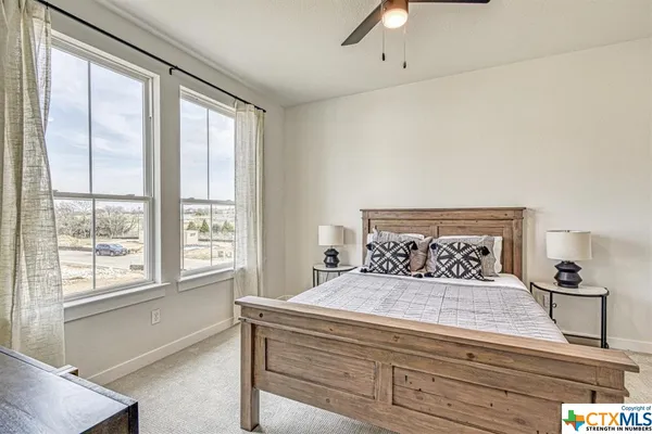 a bathroom with a tub and a sink