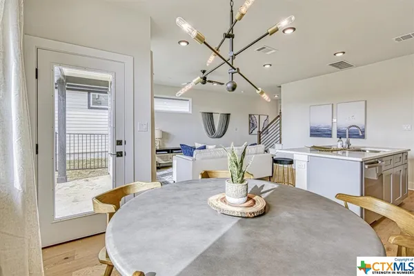 a view of kitchen and dining area