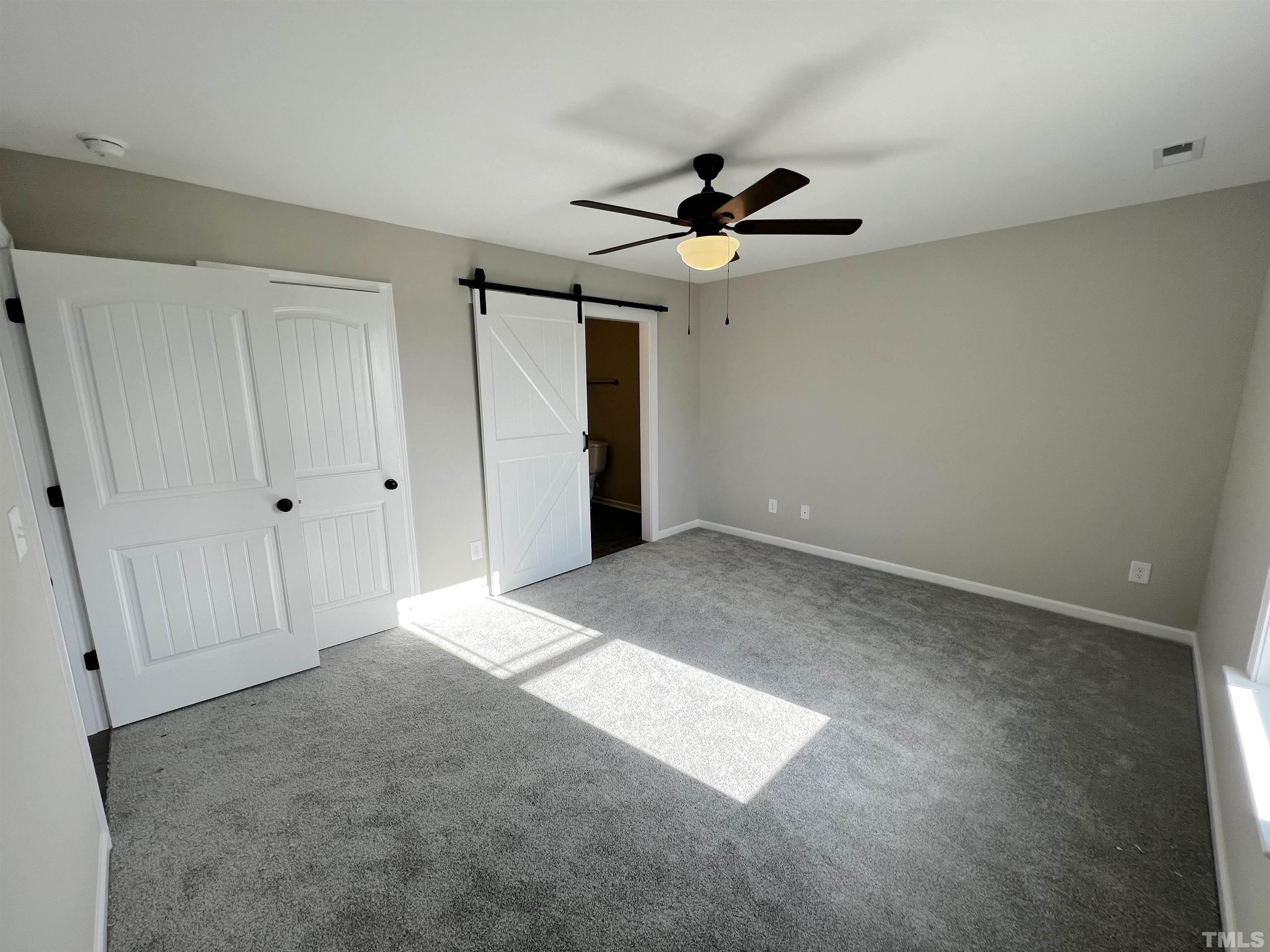 96 Mamie Road Benson, NC 27504 - Photo 16 of 20 wooden floor in an empty room