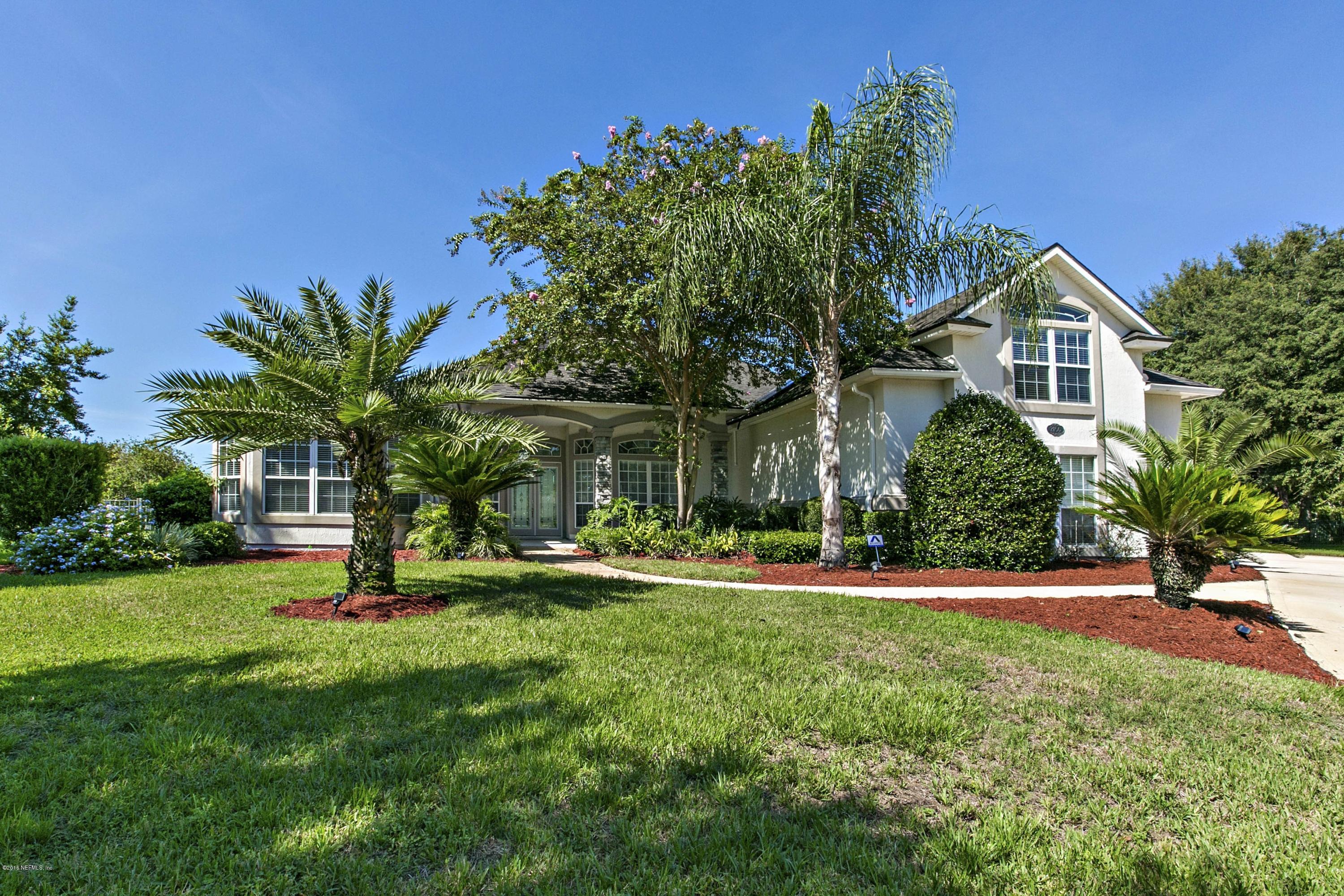 2156 West Quay Road St. Augustine, FL 32092 - Photo 1 of 51 a front view of a house with a yard