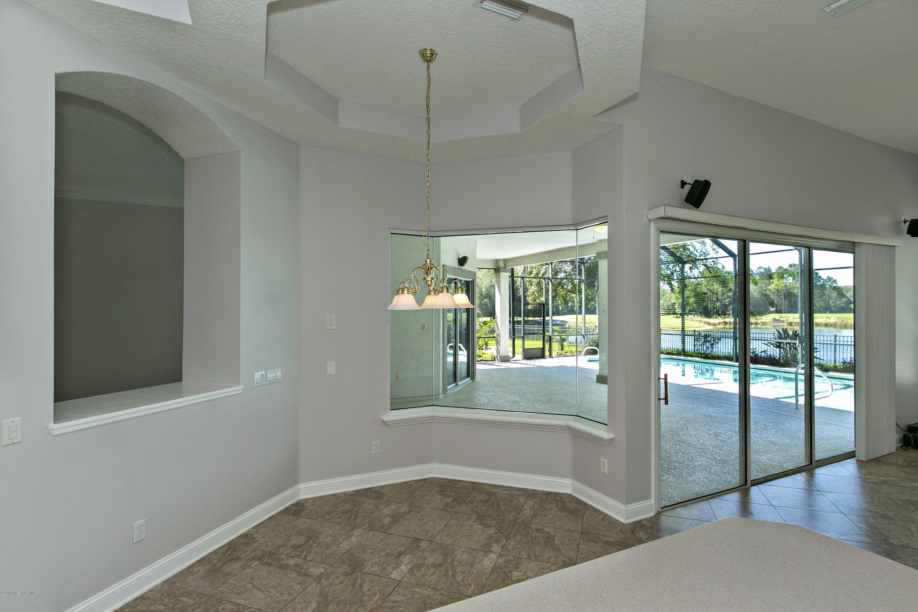 2156 West Quay Road St. Augustine, FL 32092 - Photo 11 of 51 a view of an empty room with a window