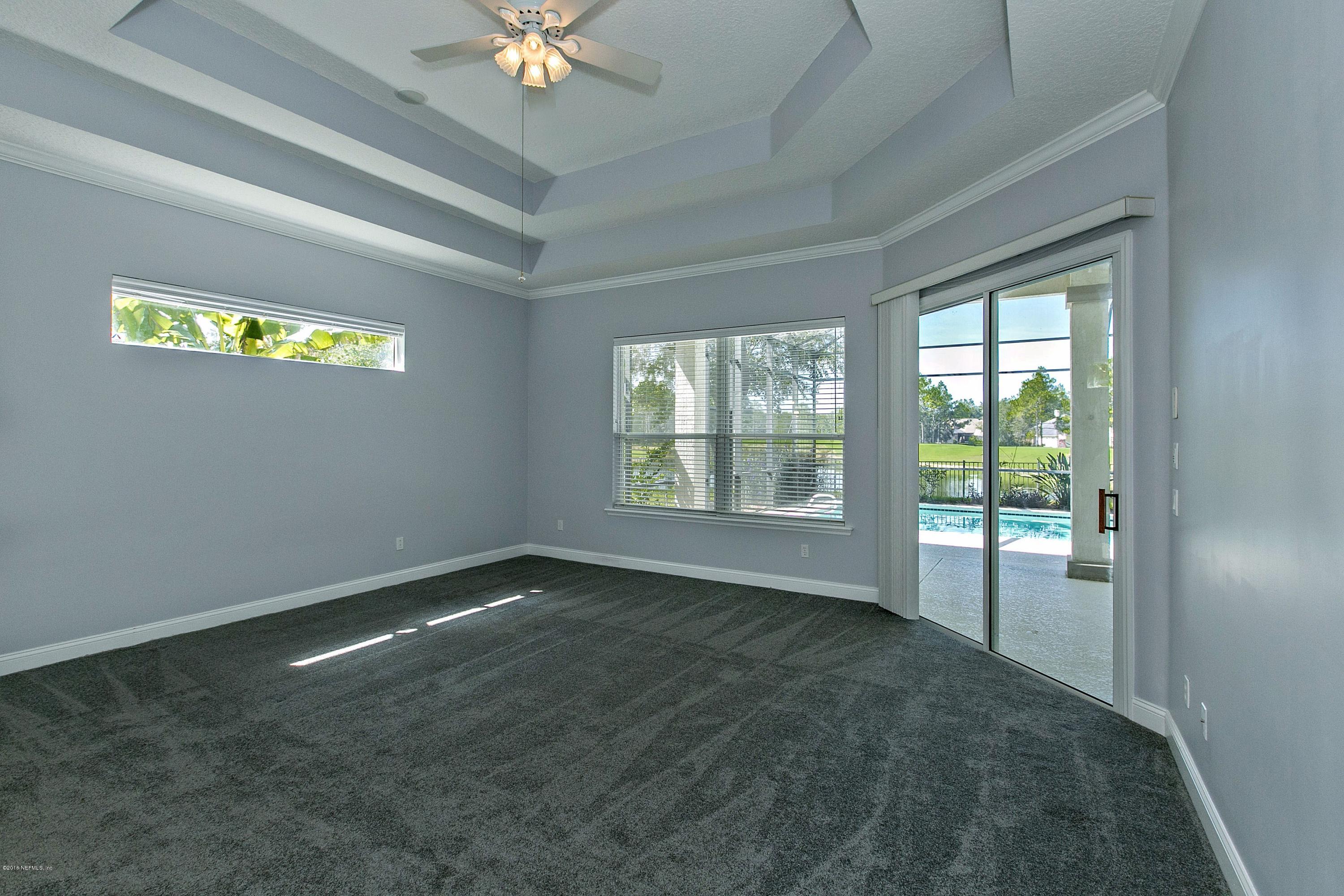 2156 West Quay Road St. Augustine, FL 32092 - Photo 14 of 51 a view of an empty room with a window