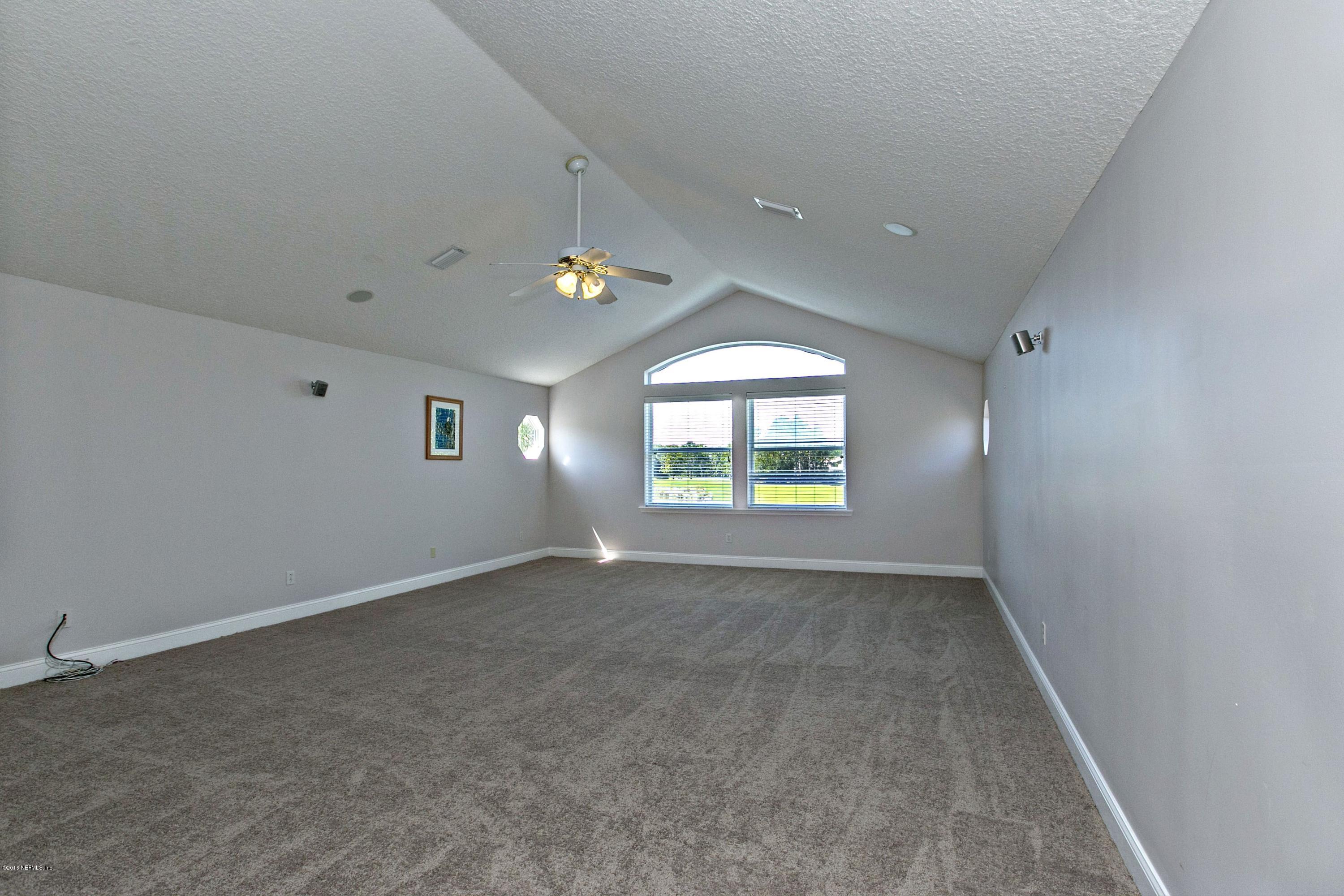 2156 West Quay Road St. Augustine, FL 32092 - Photo 24 of 51 an empty room with windows