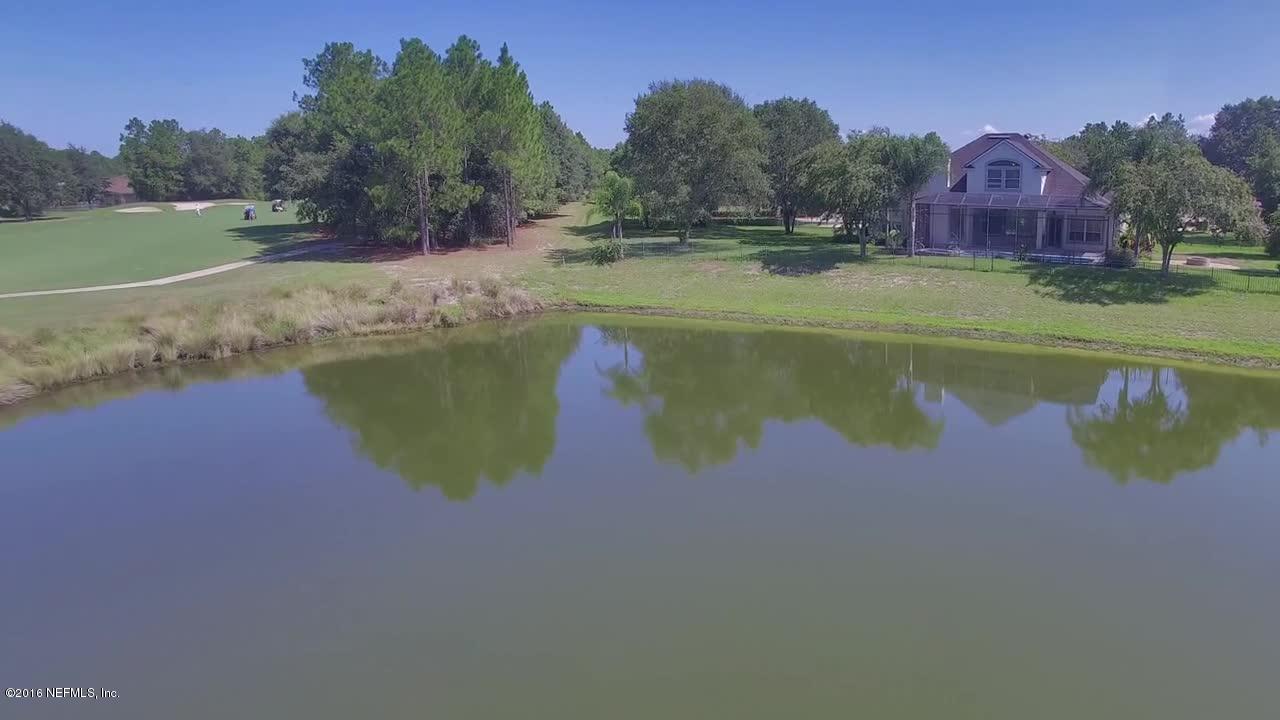 2156 West Quay Road St. Augustine, FL 32092 - Photo 31 of 51 a view of a lake from a yard