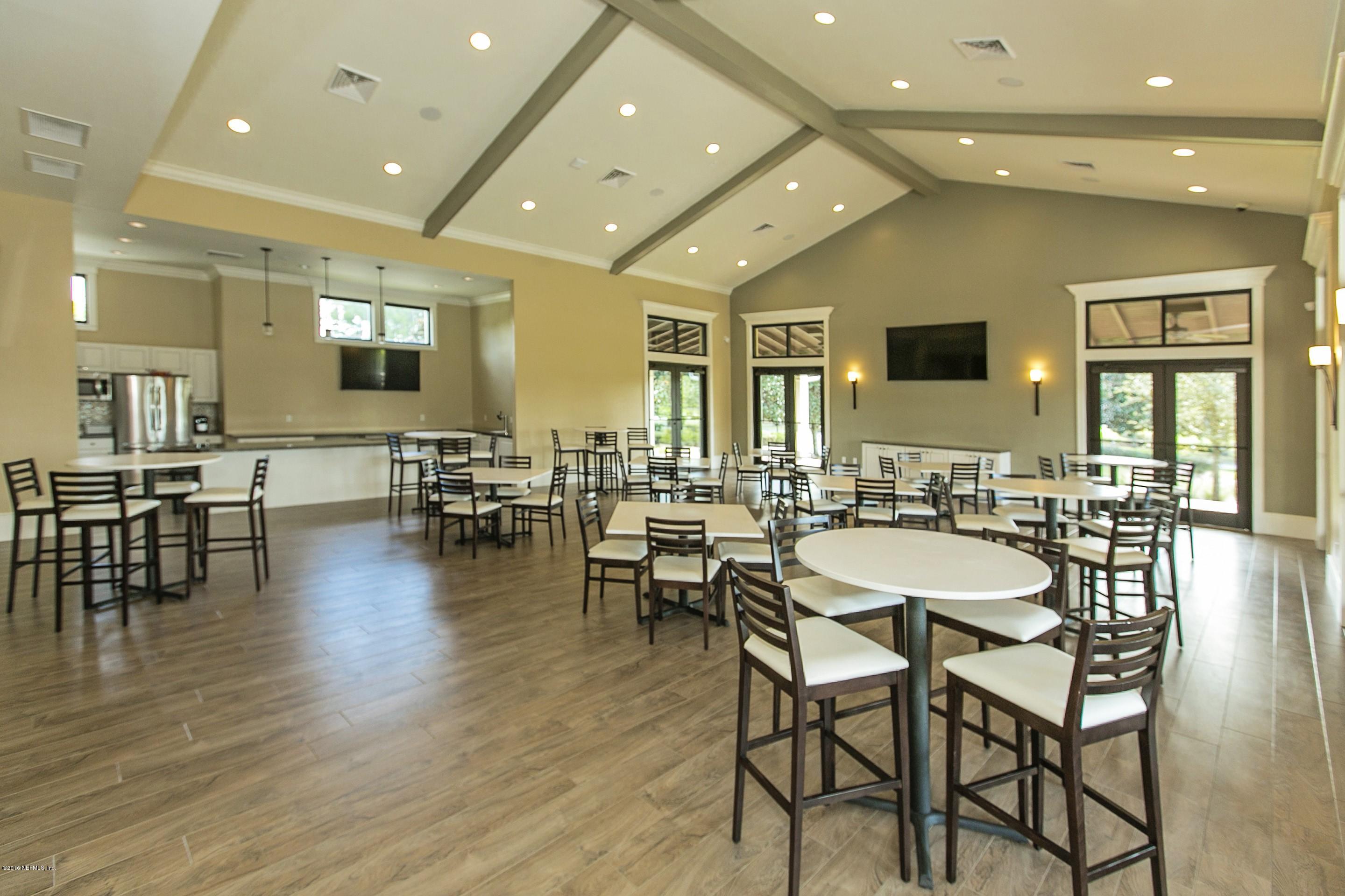 2156 West Quay Road St. Augustine, FL 32092 - Photo 41 of 51 a view of a dining room with furniture and wooden floor