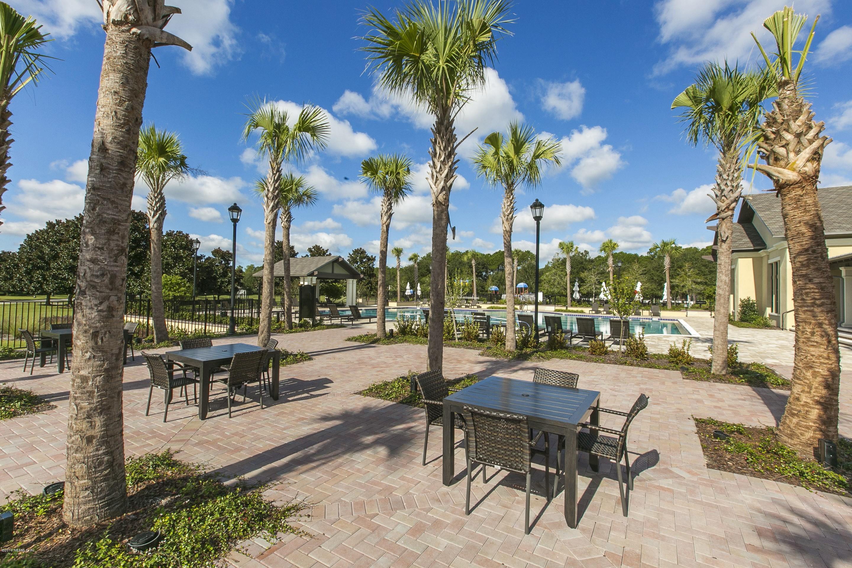 2156 West Quay Road St. Augustine, FL 32092 - Photo 43 of 51 a view of a backyard with sitting area