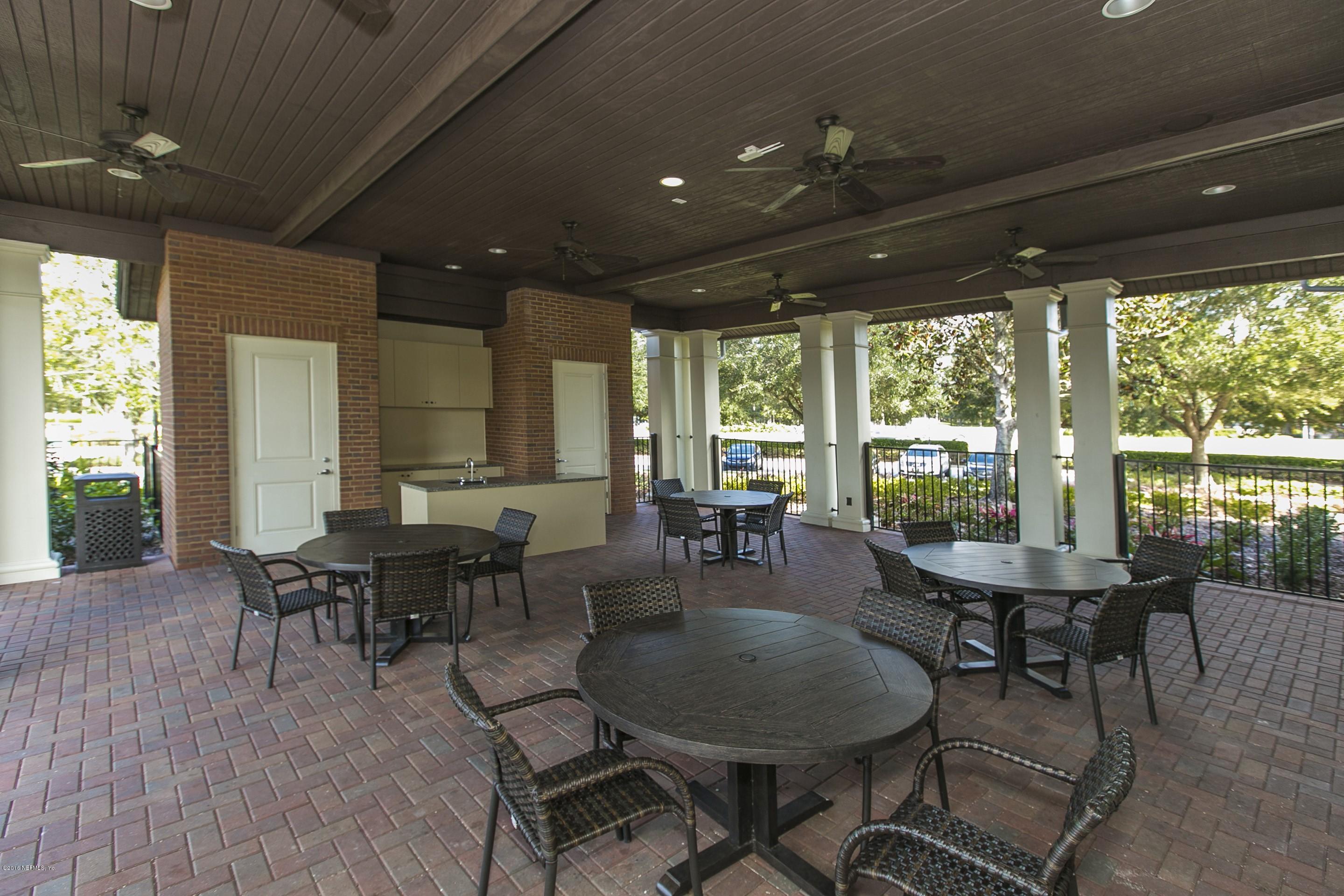 2156 West Quay Road St. Augustine, FL 32092 - Photo 50 of 51 a view of a dining room with furniture window and outside view