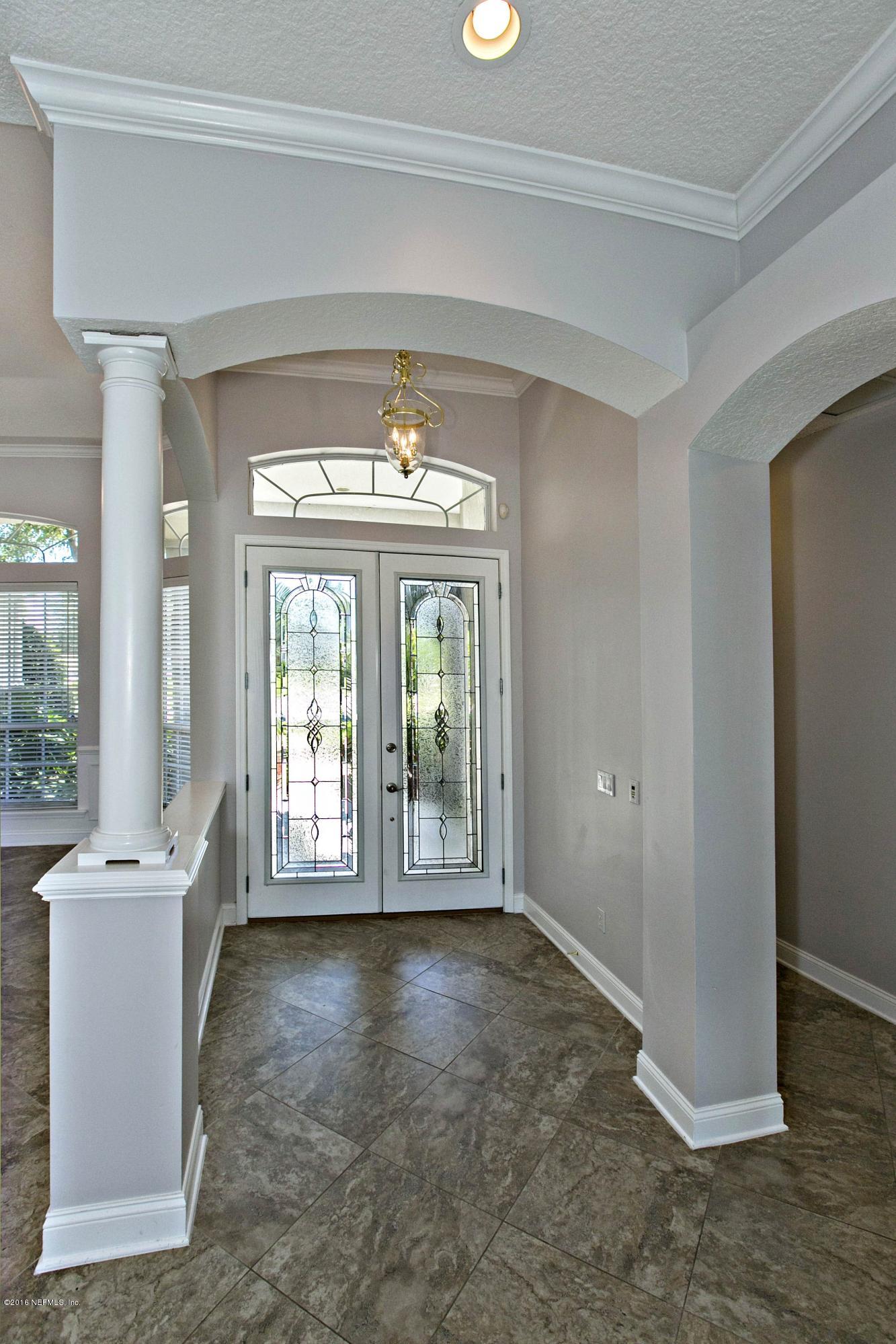 2156 West Quay Road St. Augustine, FL 32092 - Photo 5 of 51 a view of an empty room with a window