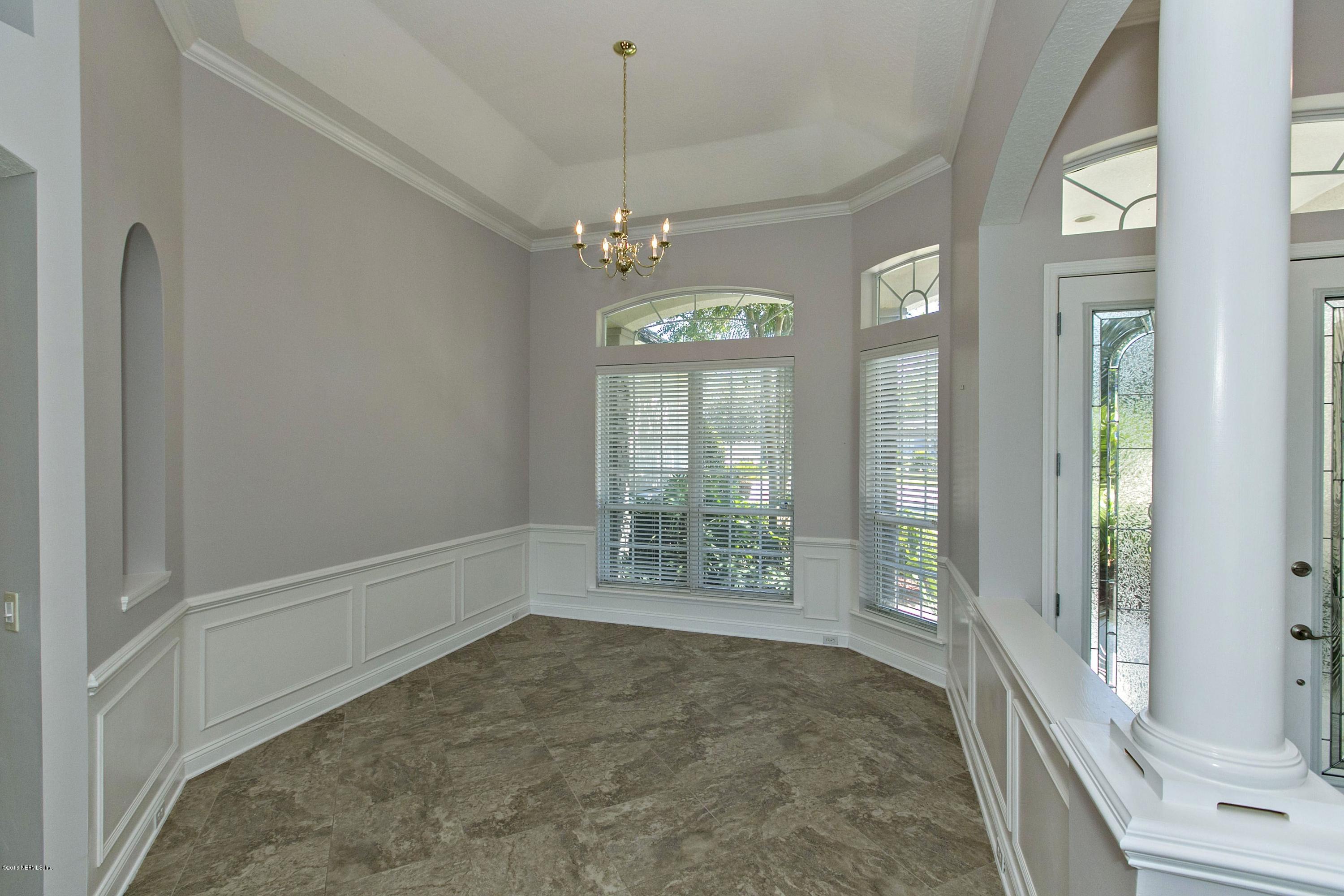 2156 West Quay Road St. Augustine, FL 32092 - Photo 6 of 51 a view of an empty room with a window