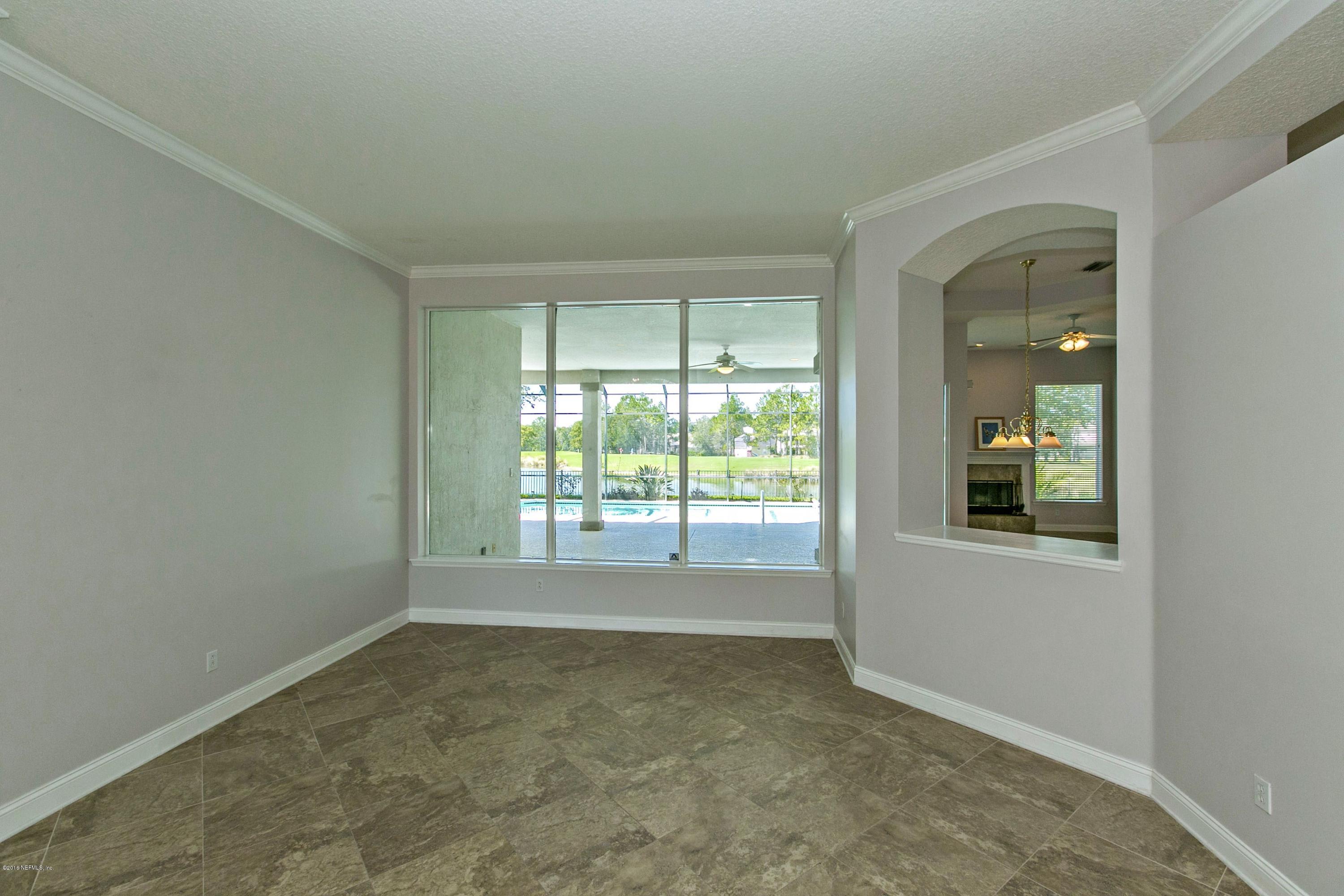 2156 West Quay Road St. Augustine, FL 32092 - Photo 7 of 51 an empty room with a window