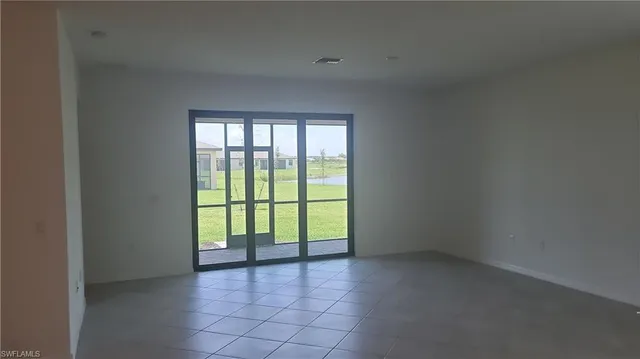 a kitchen with granite countertop a sink and a stove top oven with granite countertops
