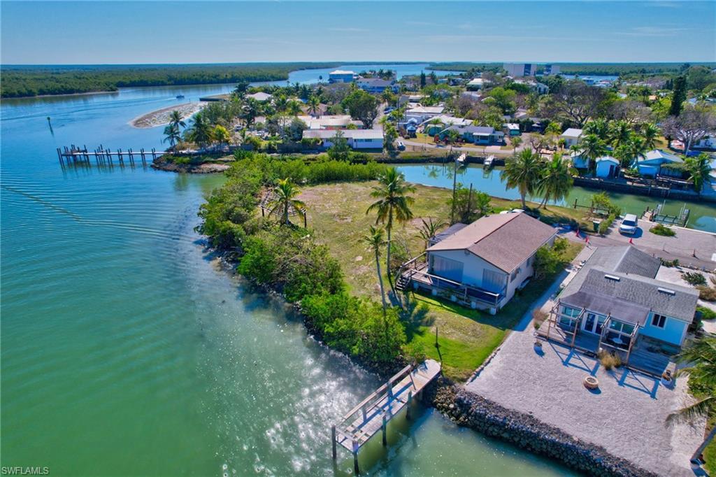 105 Bayshore Way Goodland, FL 34140 - Photo 4 of 7 Aerial view with a water view