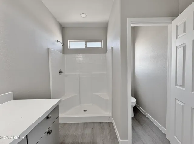 a view of an empty walk in closet