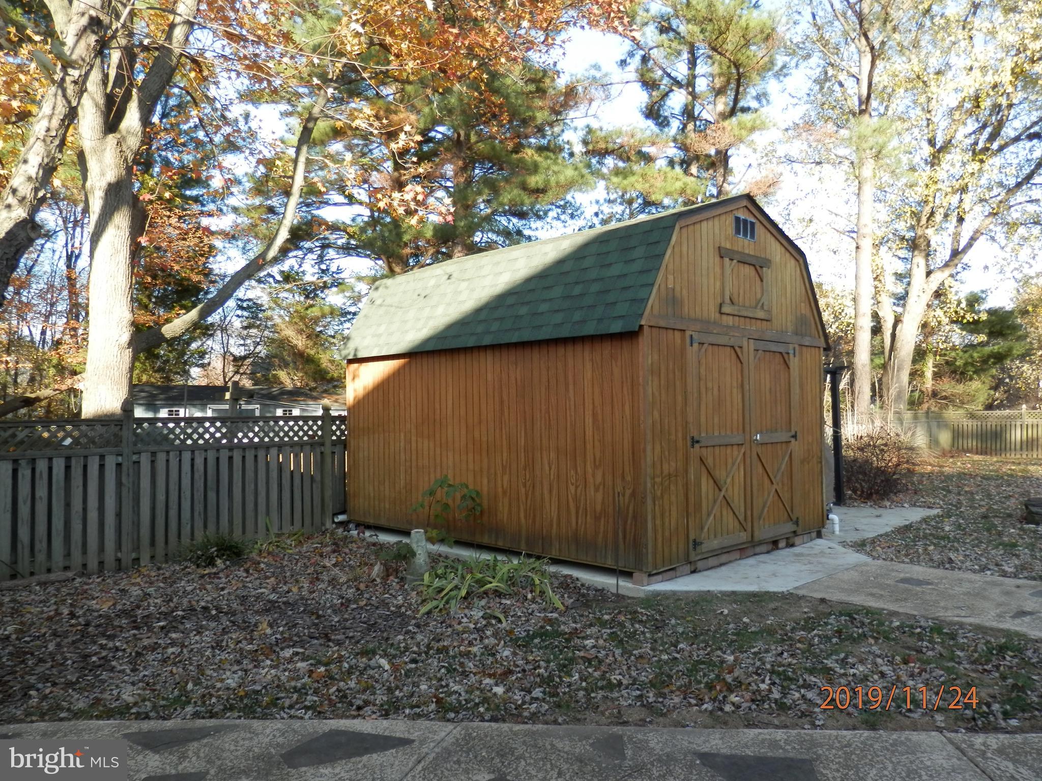 133 Long Point Road Stevensville, MD 21666 - Photo 29 of 36 Shed w/electric in rear yard