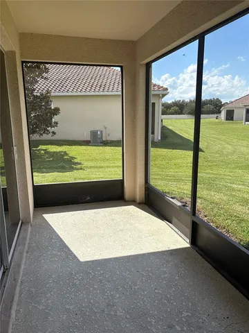 a view of a large window with an outdoor space