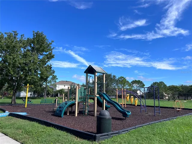 a view of a house with a park