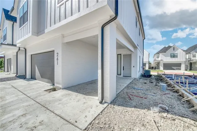 a view of a hallway with a building and stairs