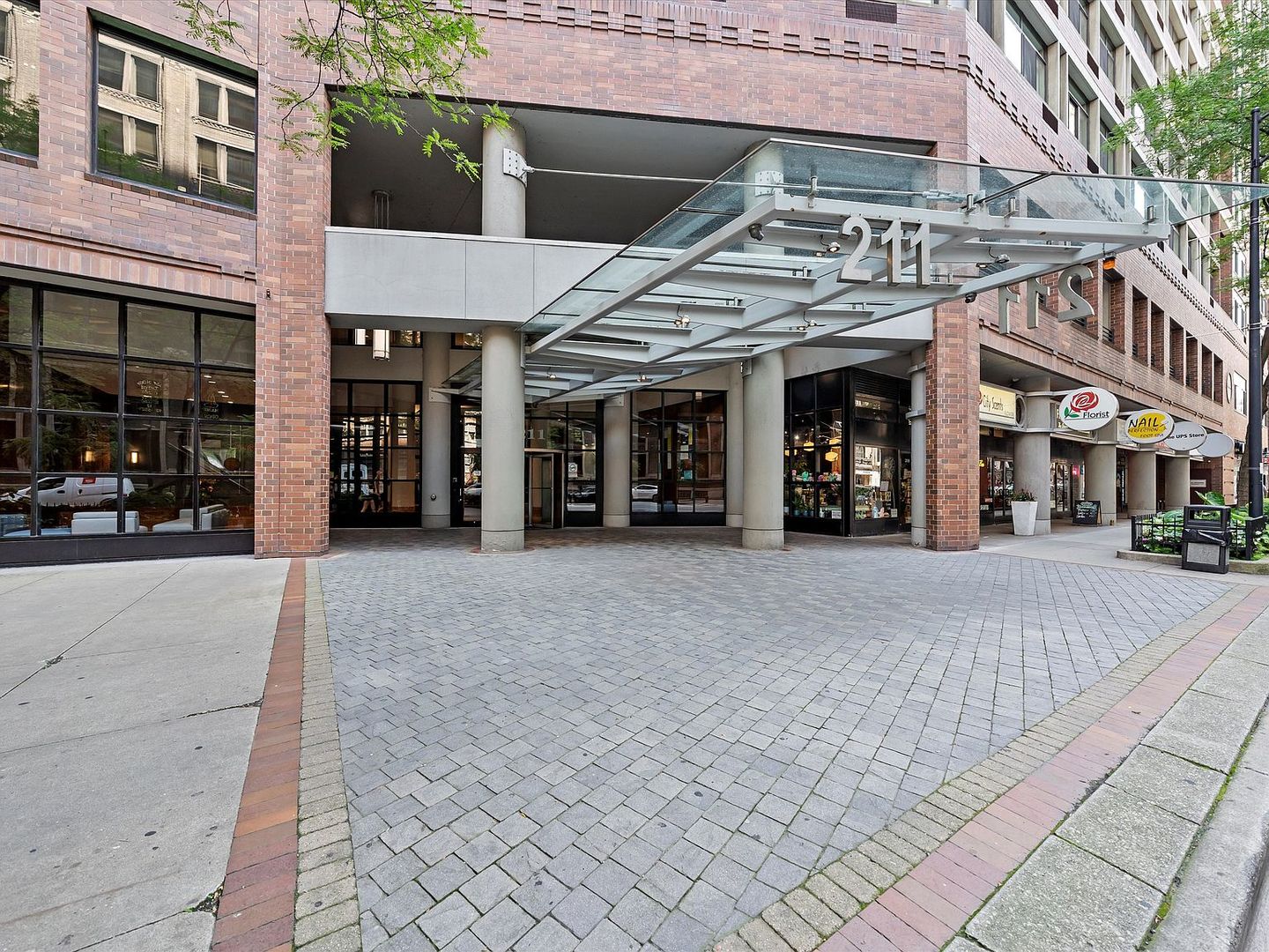 211 East Ohio Street, Unit 307 Chicago, IL 60611 - Photo 1 of 30 a view of a building with a street