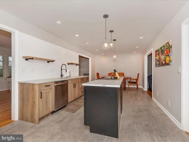 a bedroom with a bed and a fireplace