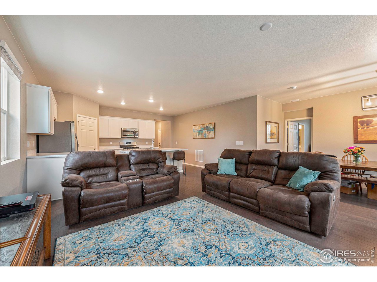 7005 Morrison Drive Frederick, CO 80530 - Photo 11 of 26 a living room with furniture window and a couch