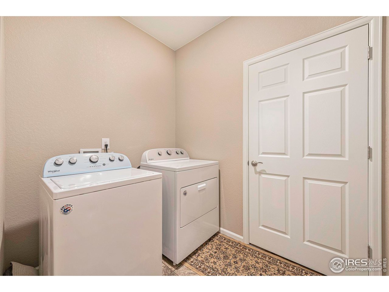 7005 Morrison Drive Frederick, CO 80530 - Photo 21 of 26 a utility room with dryer and washer