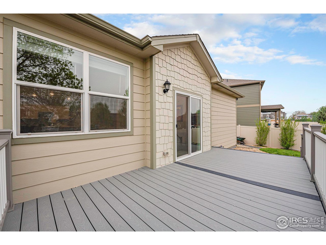 7005 Morrison Drive Frederick, CO 80530 - Photo 22 of 26 a view of a house with a roof deck