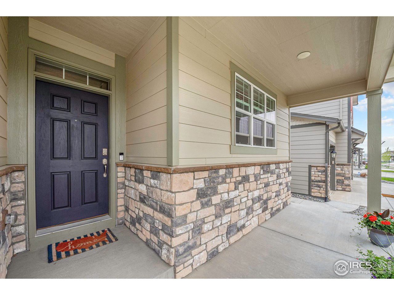 7005 Morrison Drive Frederick, CO 80530 - Photo 3 of 26 a front view of a house with outdoor seating